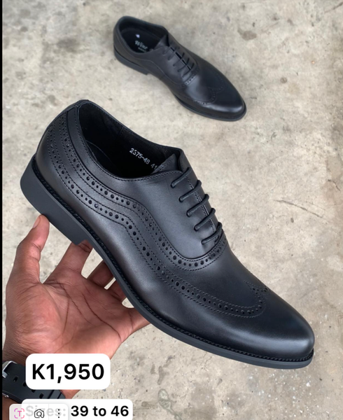 black shoes with perforation