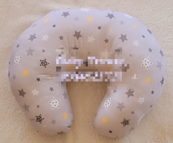 grey feeding pillow