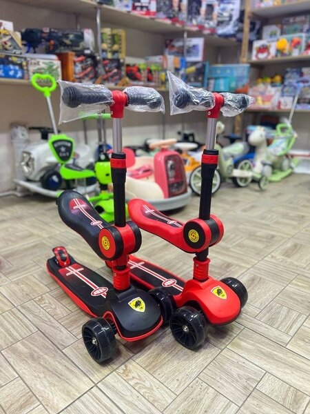 Трехколесный самокат сидушкой