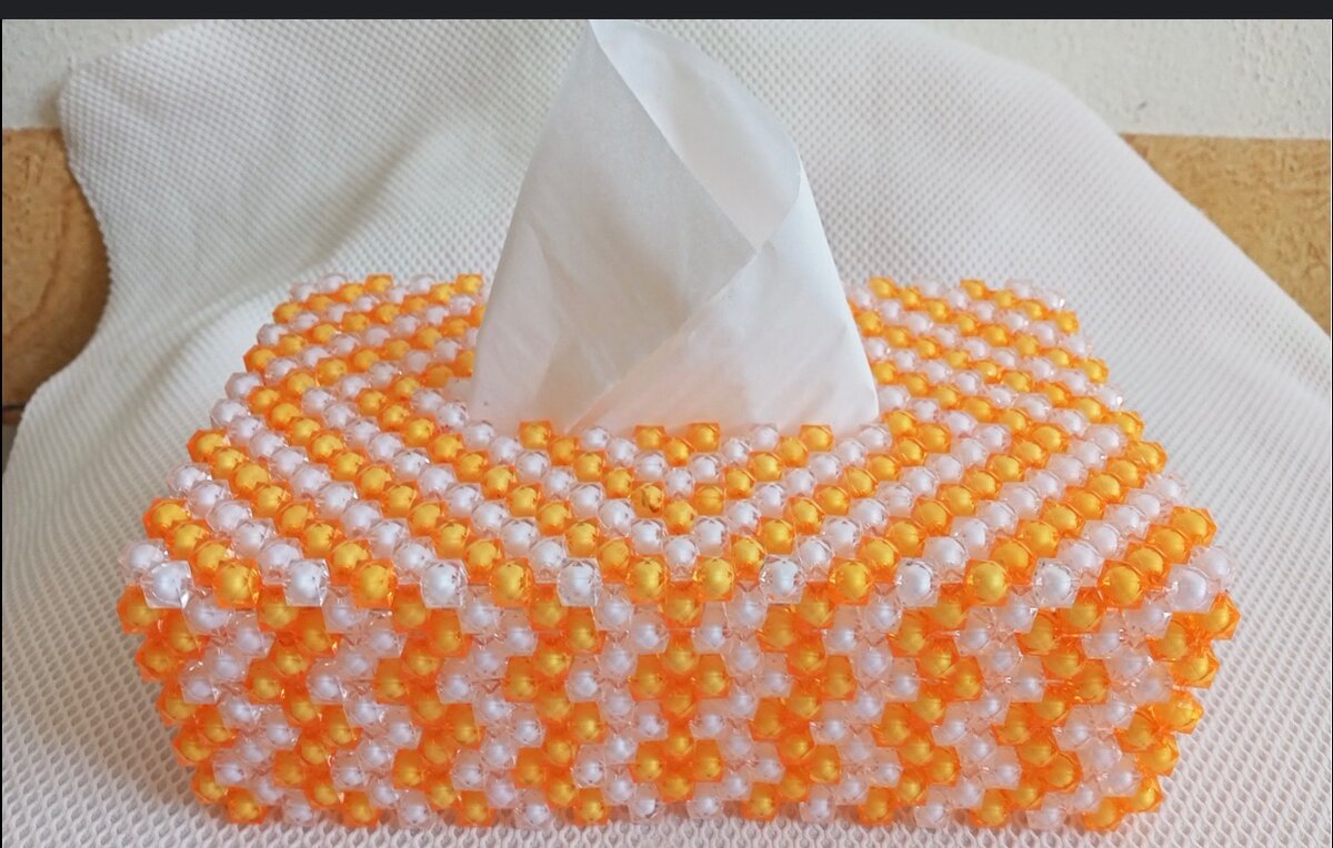 Beaded tissue holder