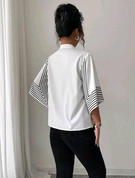 Blouse blanche à rayures élégante