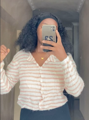 Short knitted Sweater with buttons in pink size: M