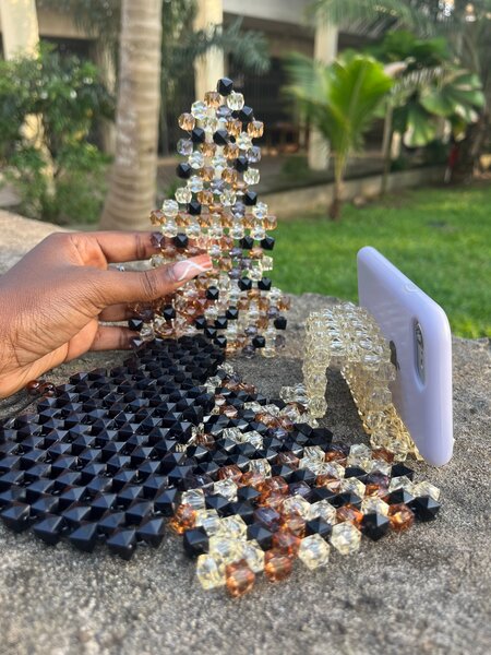 Support de téléphone en perles