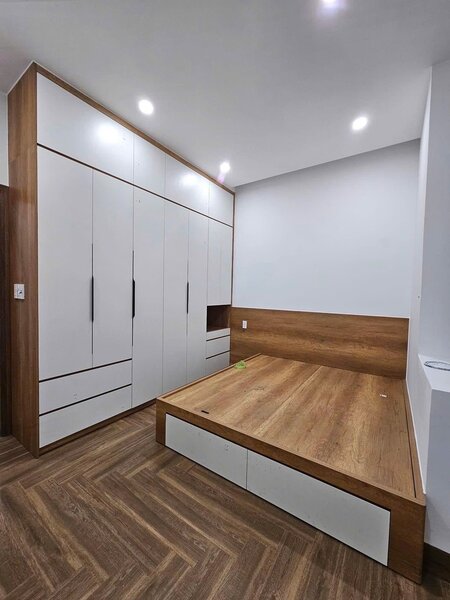 Lit plateforme avec rangement intégré