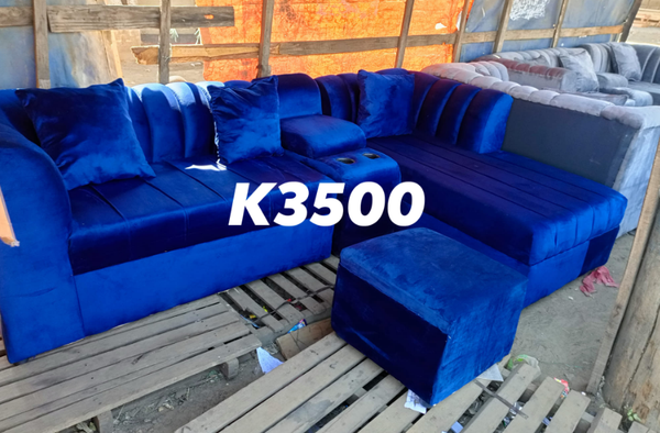 blue sofa with pouf