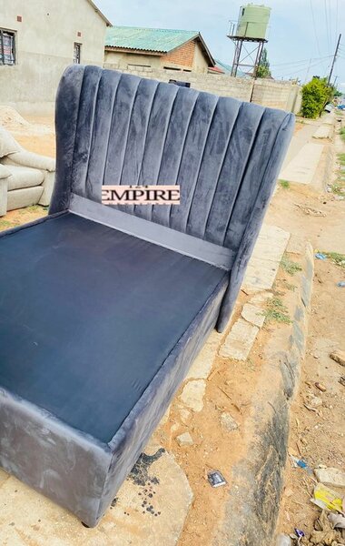 Double bed with grey upholstery