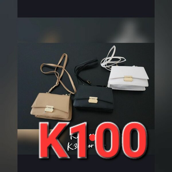 Ladies bags and baby body suits for sell