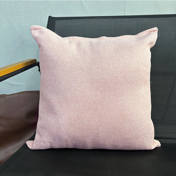 Coussin décoratif rose doux