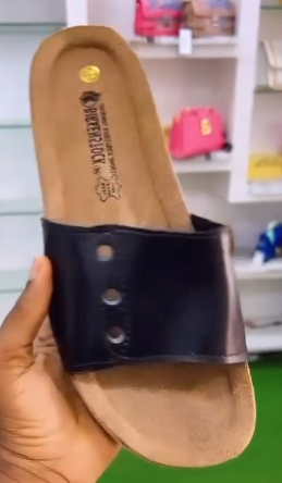 Black sneakers with holes