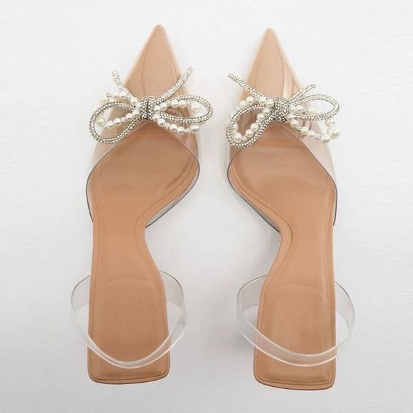High heels with butterfly knots and pearl embellishments