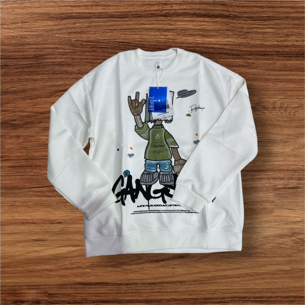 white sweatshirt with graffiti print