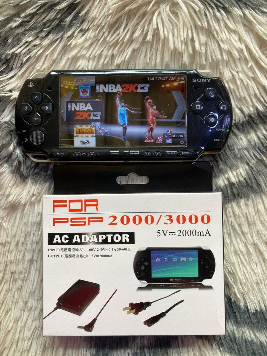 Console PSP 2000/3000 avec adaptateur
