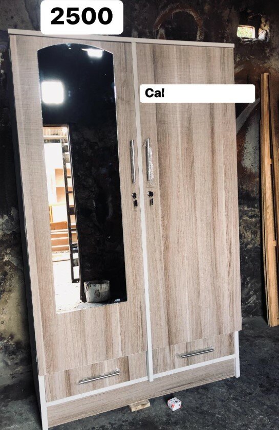 Beautiful beige wardrobe with mirror