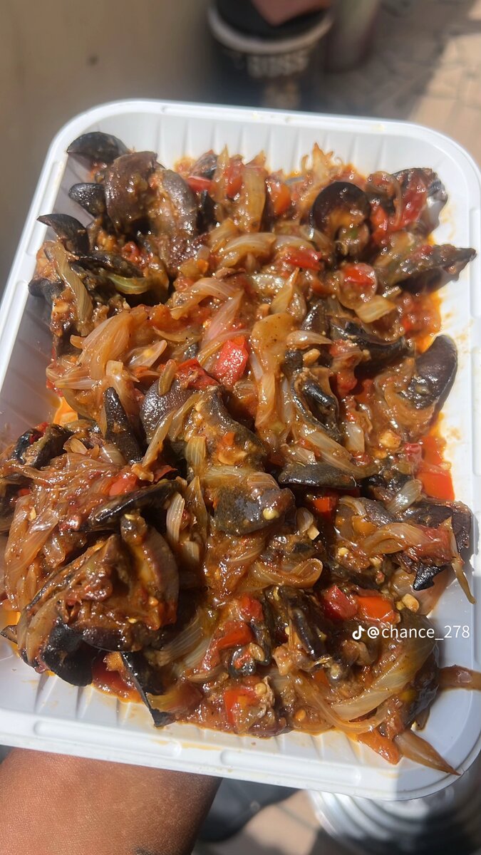 Escargots épicés en sauce