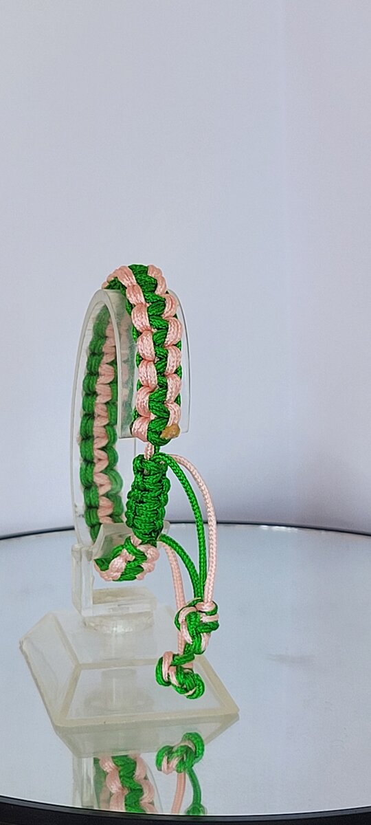 Bracelet tissé vert et rose