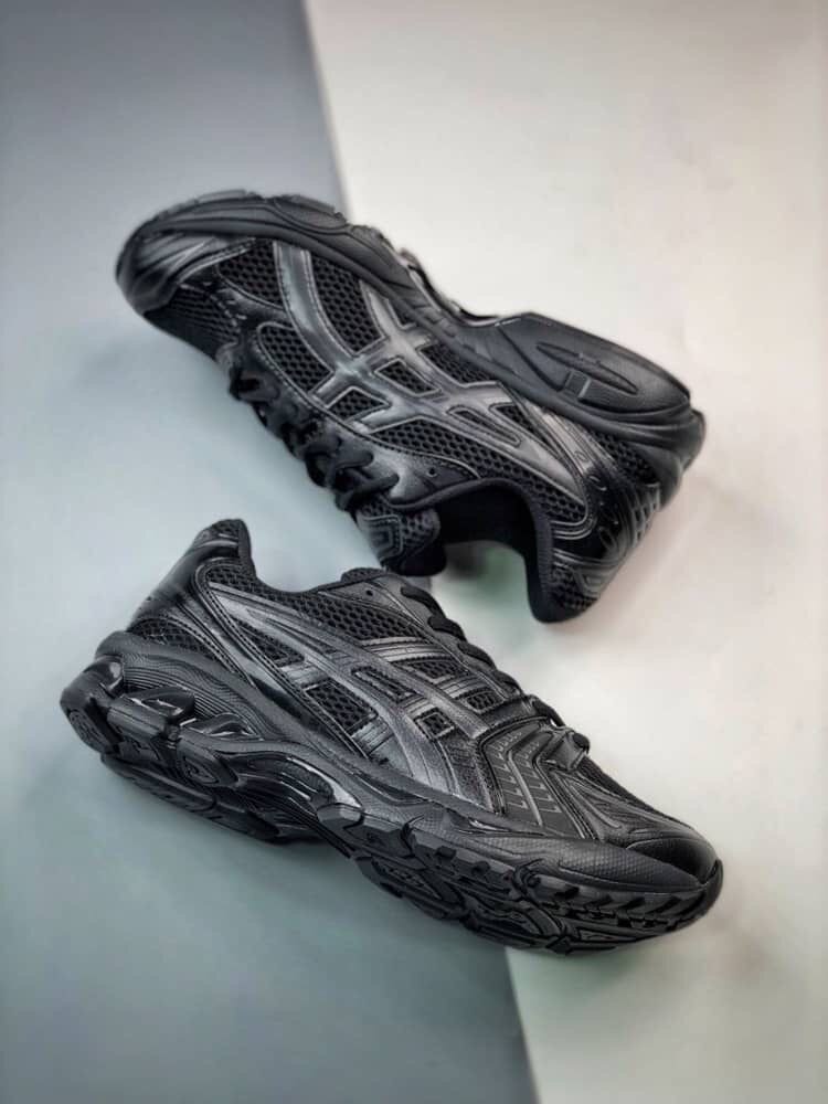 Chaussures de course noires Asics