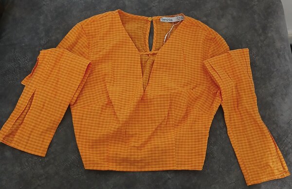 Blouse orange à carreaux