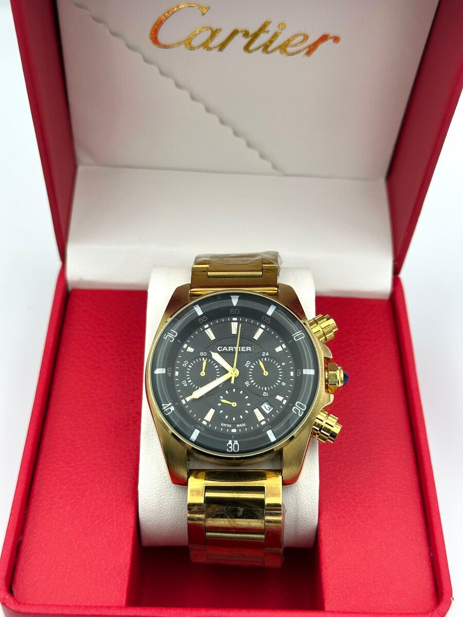 Montre homme dorée Cartier luxe