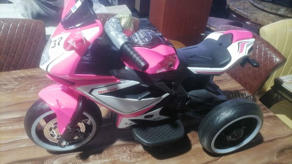 black and pink motorcycle
