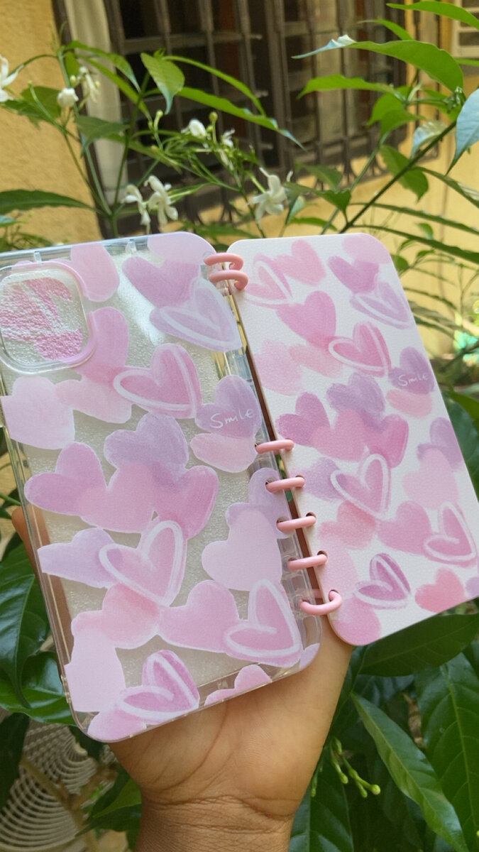 Étui téléphone à cœurs roses