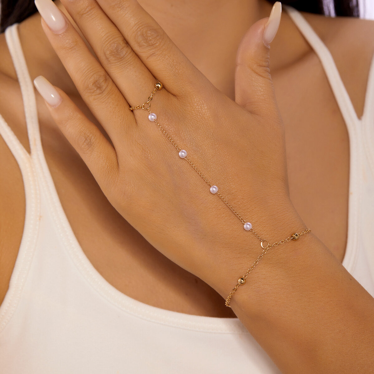 Bijou de main perlé élégant