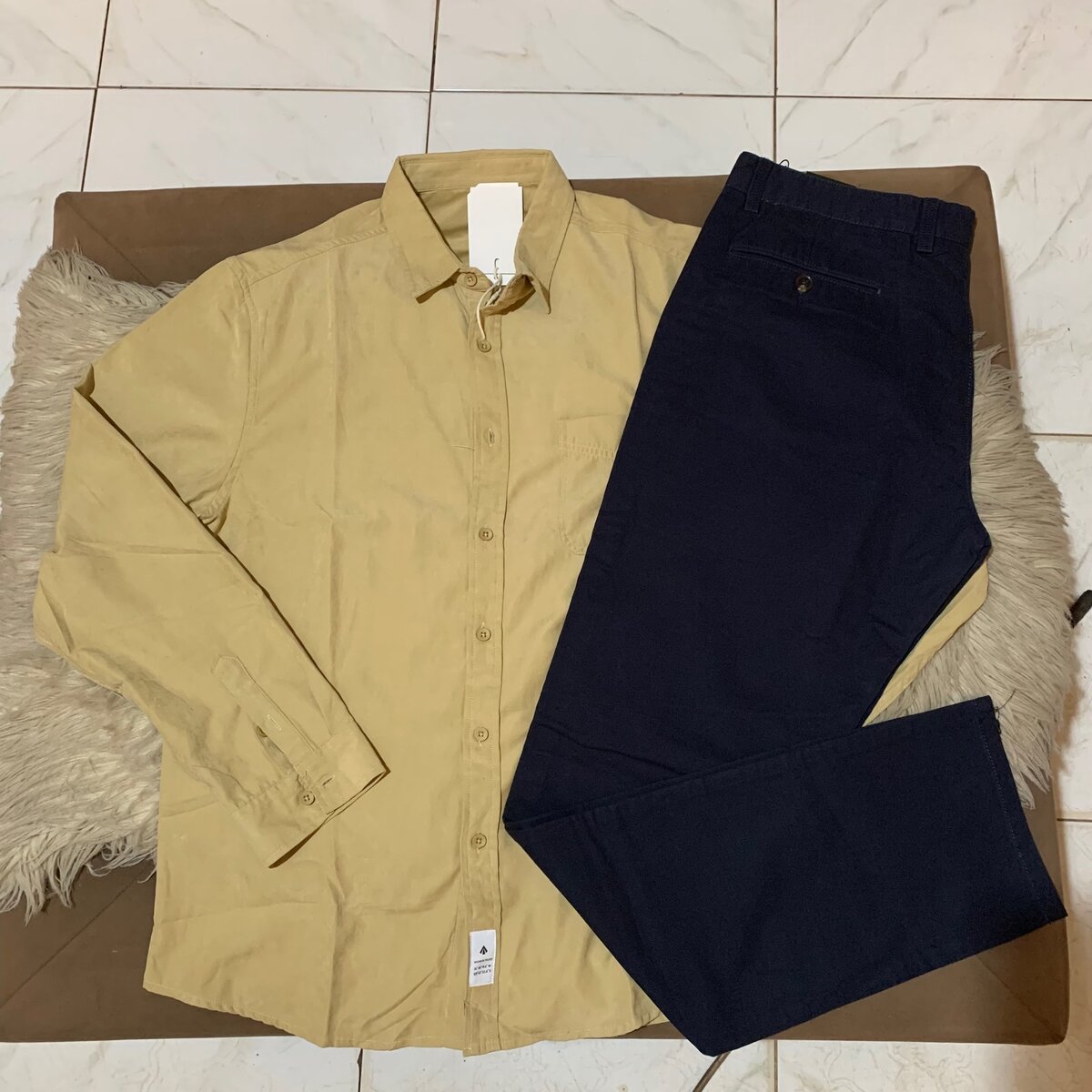 Long sleeves and khaki trousers