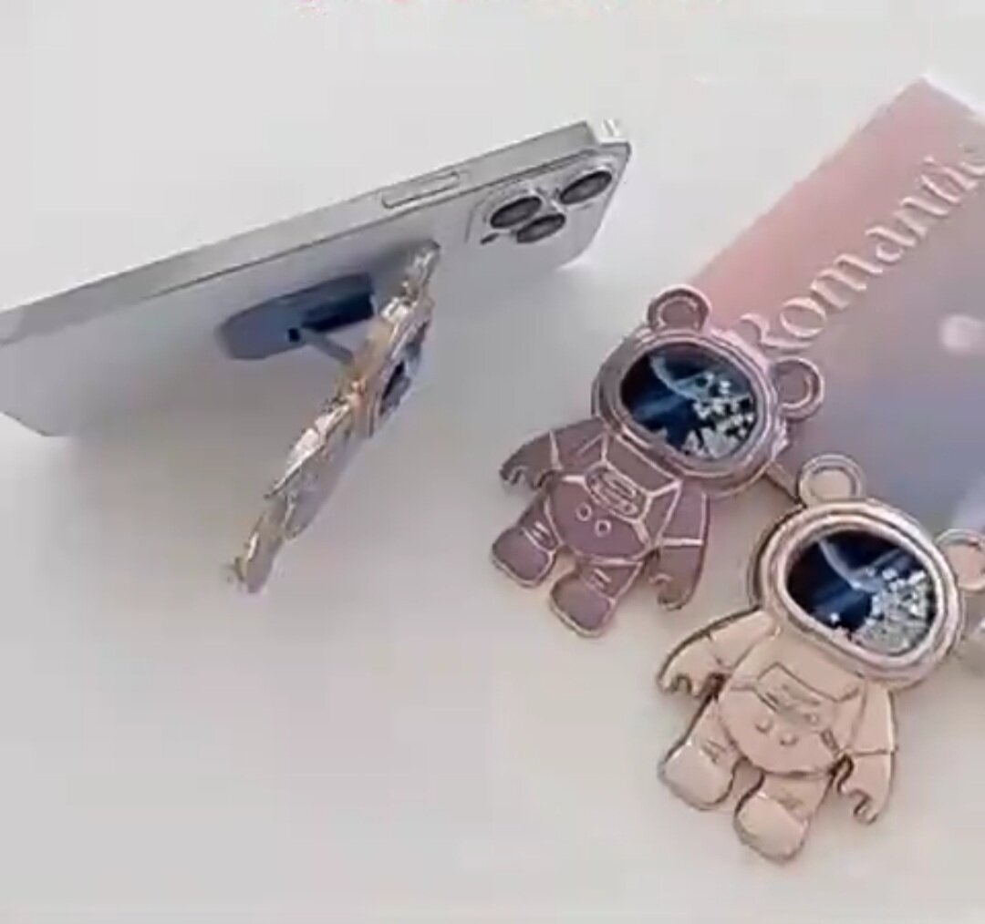 Support téléphone astronaute