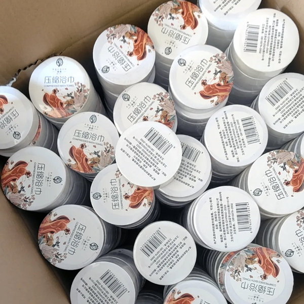 Serviette jetable compressée