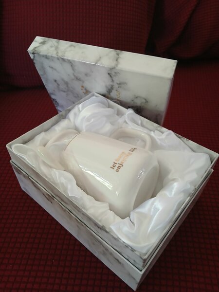 Mug cup ,spoon and a cover