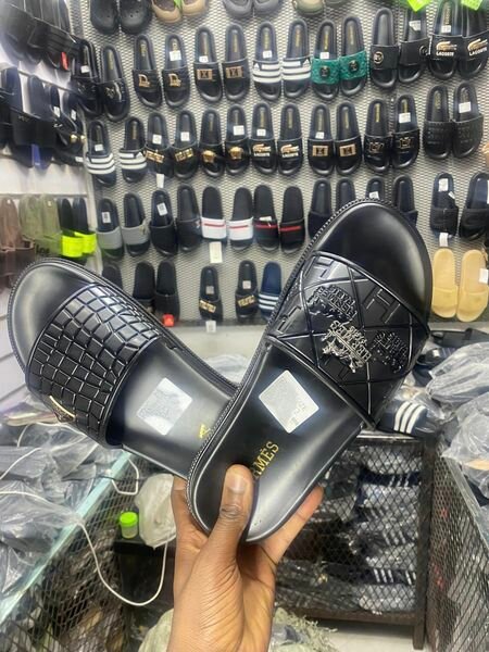 black adidas flip flops