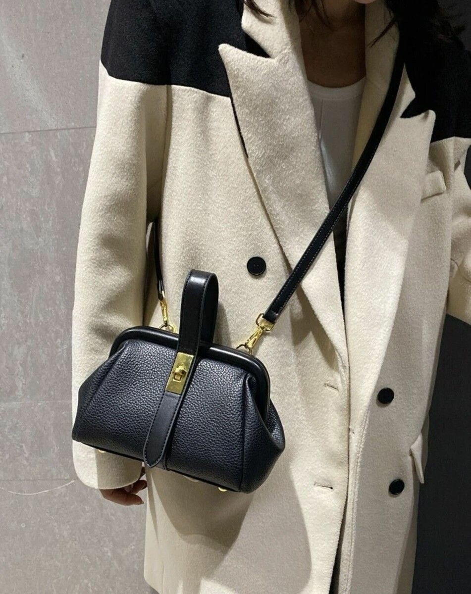 Sac à main en simili cuir noir