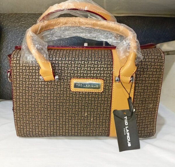 Sac à main élégant Ted Lapidus