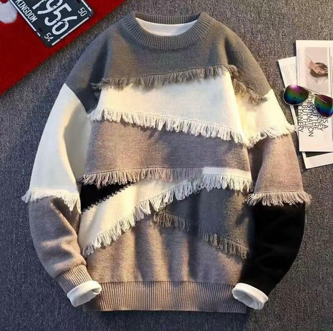 Pull en laine à franges homme