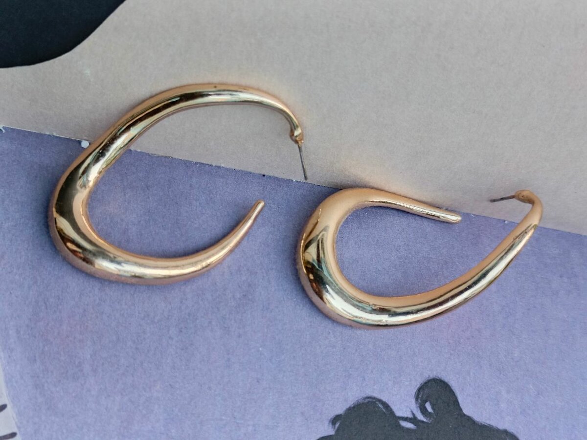 Boucles d'oreilles dorées élancées