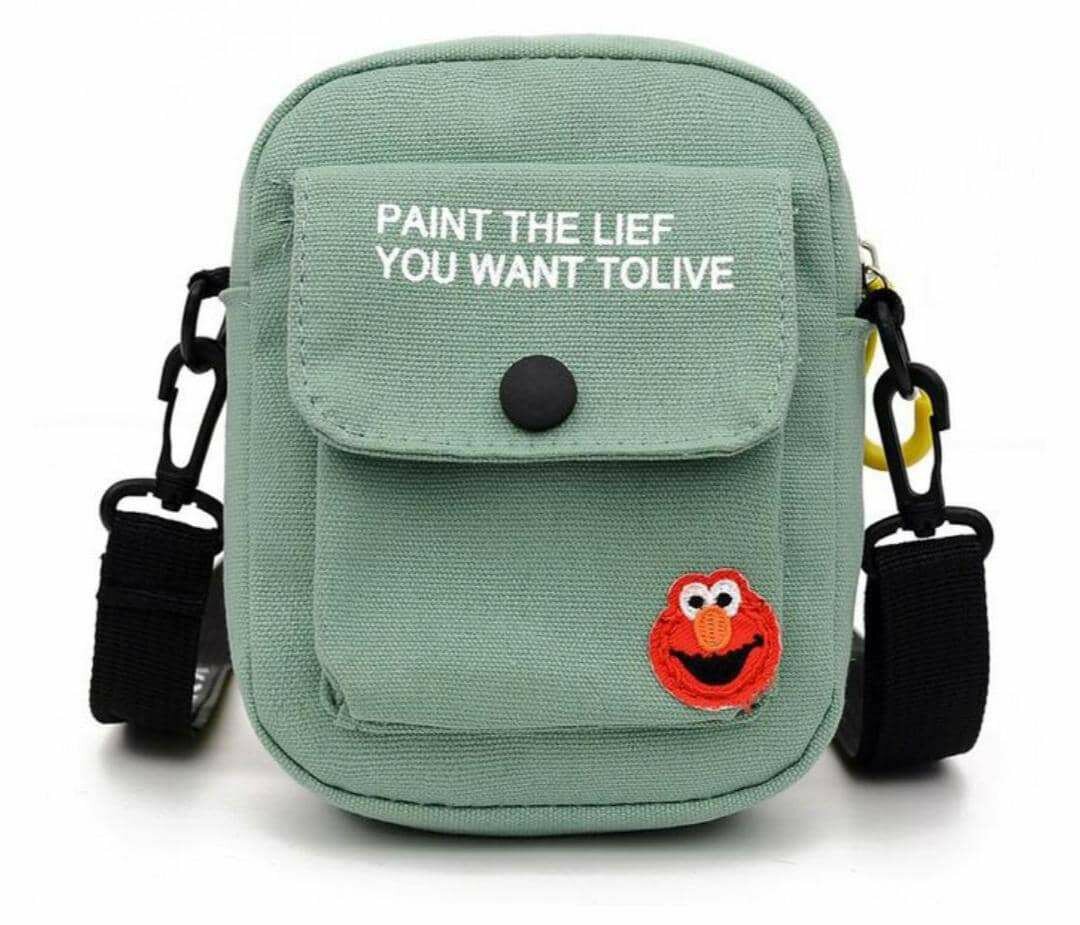 Sac bandoulière en 4 couleur vert ,jaune, noir , blanc