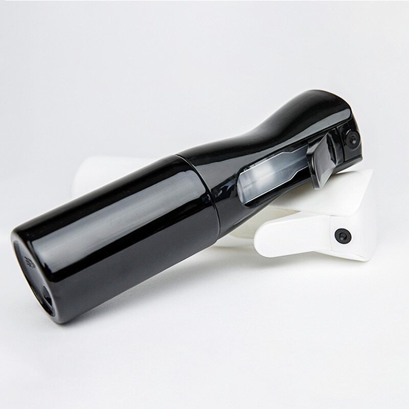 Vaporisateur pour l'entretien des cheveux