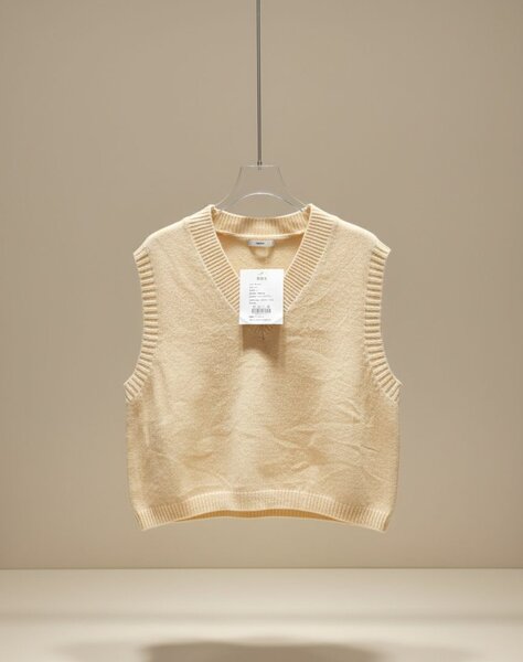 Cardigan/ pull sans manches