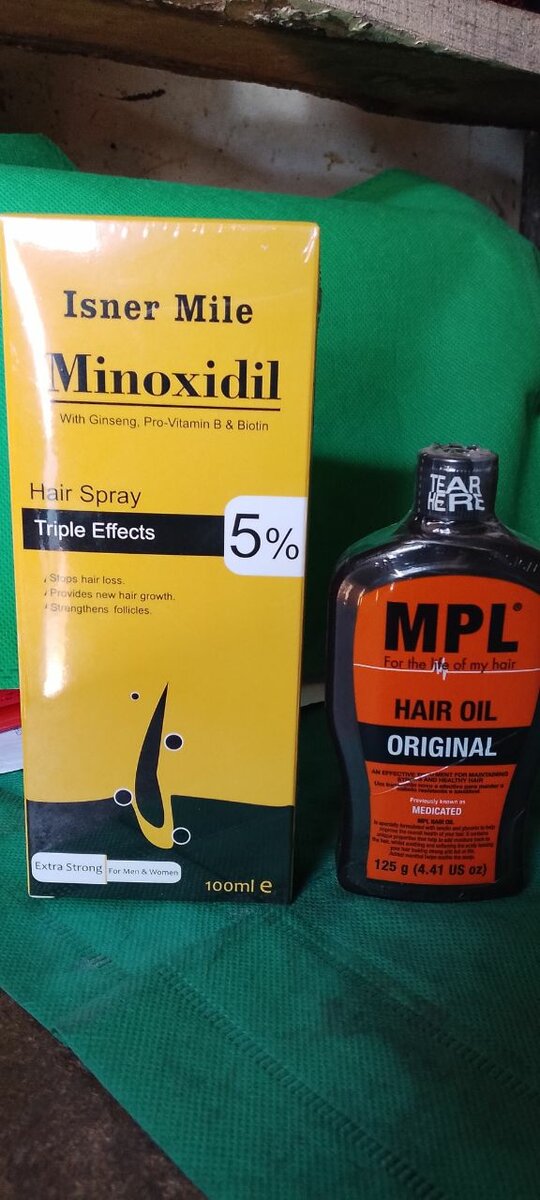 Minoxidile and hair oil
