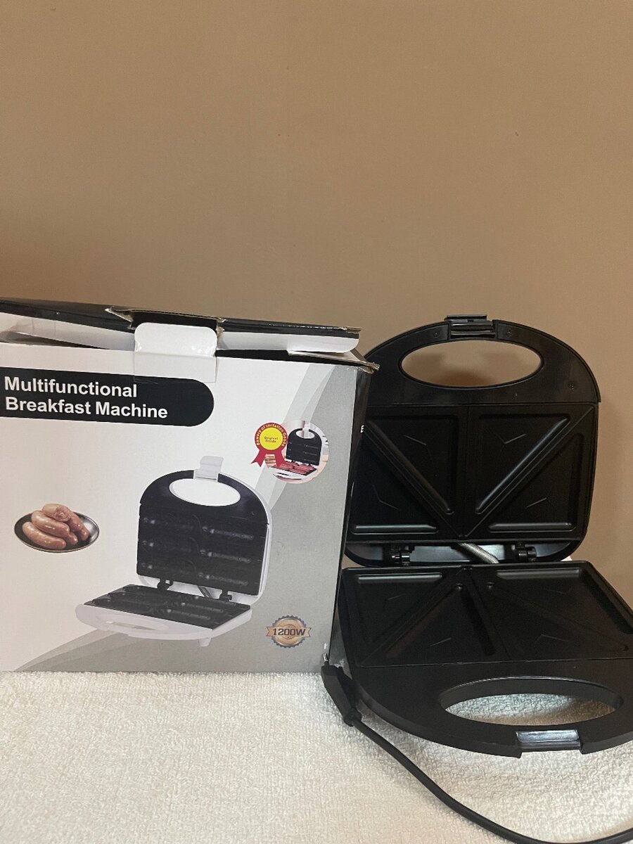 Bread toaster/sandwich maker
