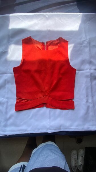 Red shirt, blue floral dress, blue tie and dye shirt