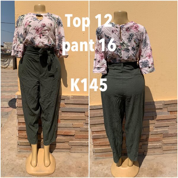 Set light pink blouse with print, size 12, dark gray trousers size 16