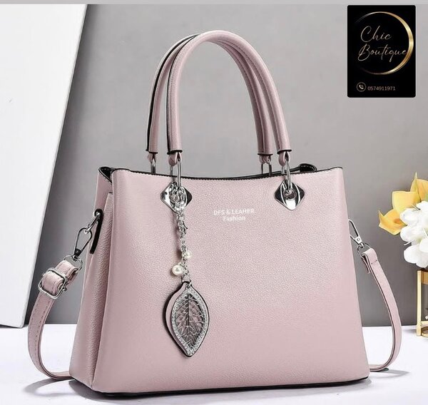 Sac à main en cuir rose élégant