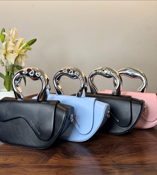 Ladies fluffy and leather hand bags