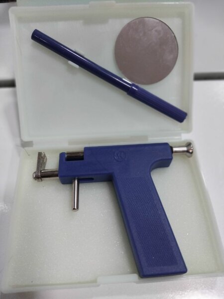 Nail drill, piercing gun,  facial brush