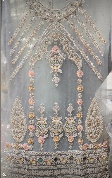 Beautiful and stylish women's outfit decorated with embroidery