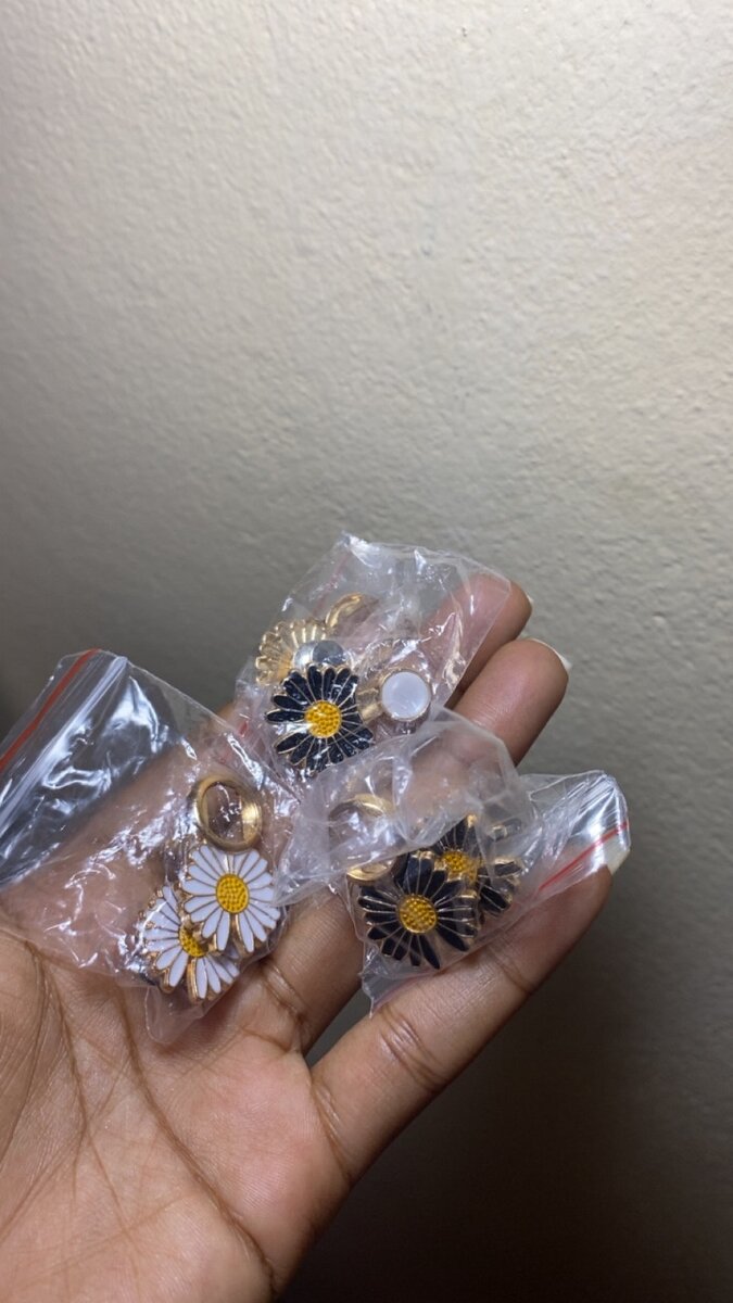 Boutons réglables marguerites