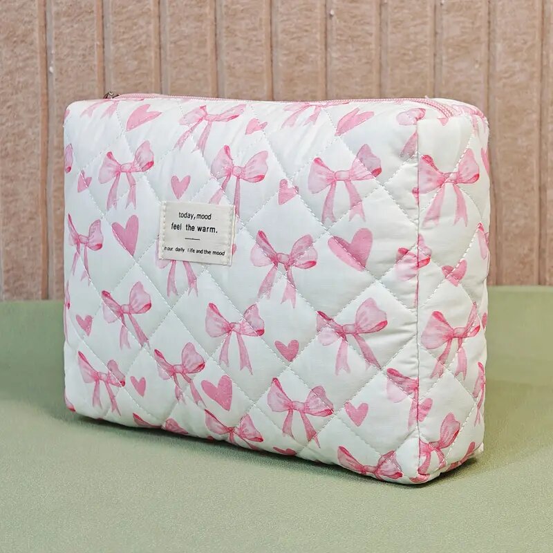 Pochette matelassée à motifs