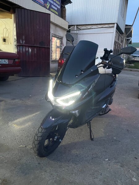 Макси скутер 2025 масло