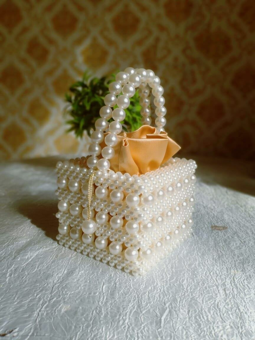 Sac à main perles élégant