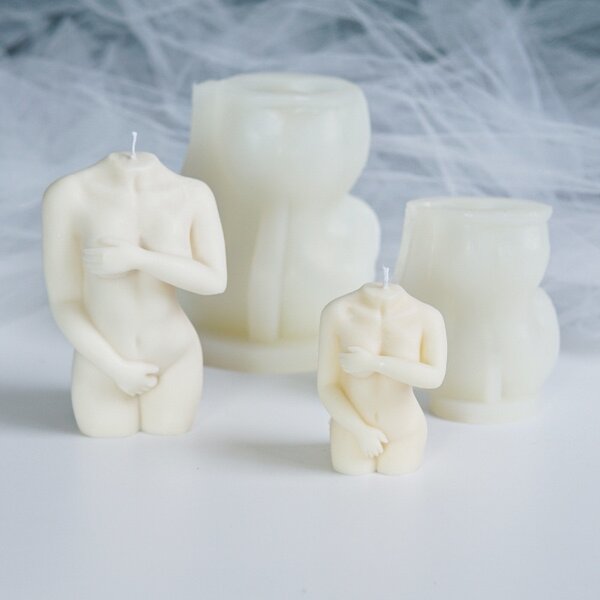 Lady with hands covering top and down candle mould